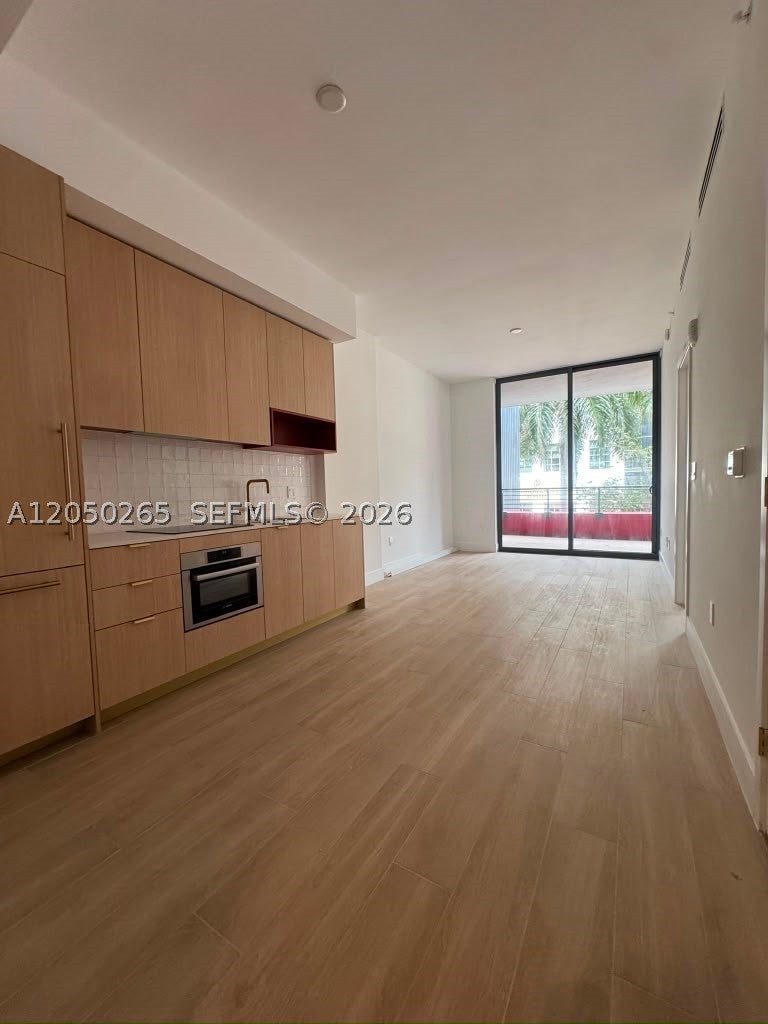 90 NE 32 ST 210