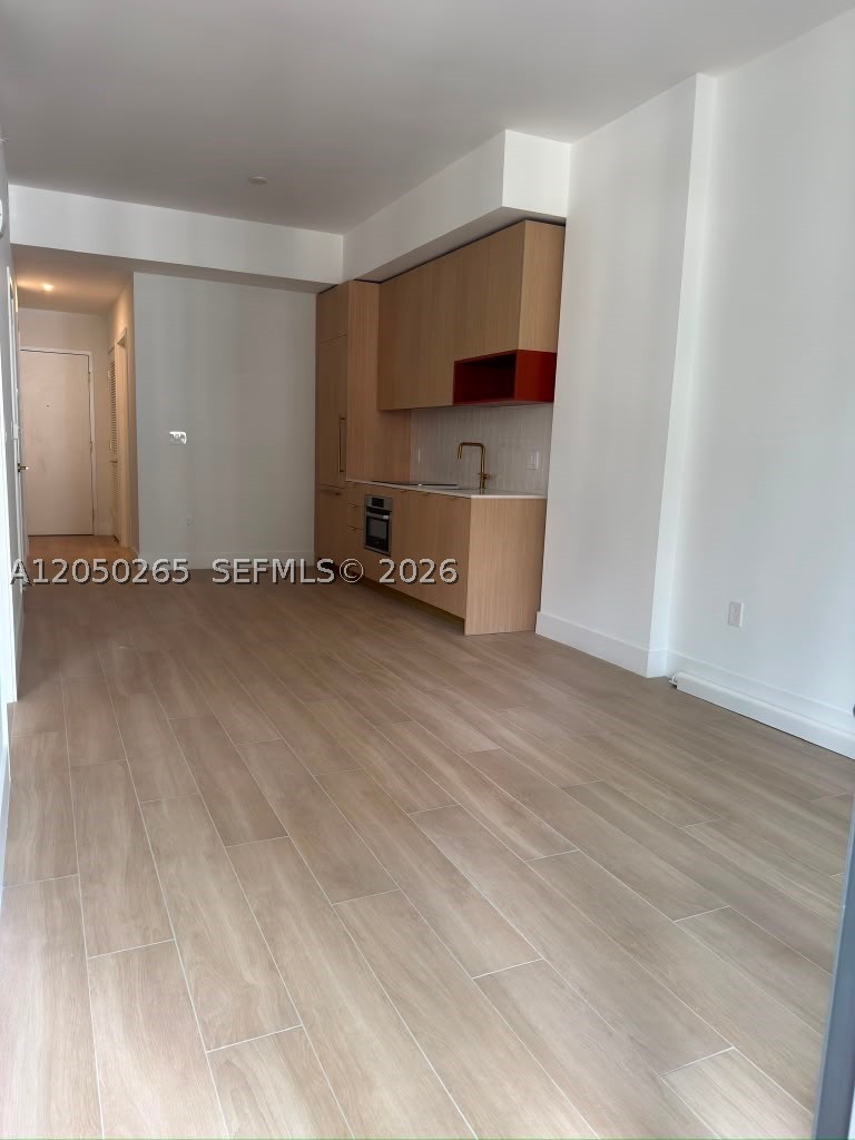 90 NE 32 ST 210
