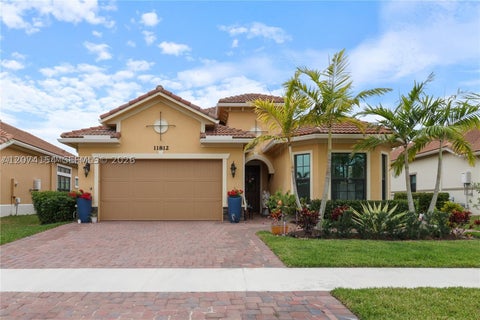 Photo of 11812 S Cantal Cir S, Parkland, FL 33076 (MLS # A12074154)