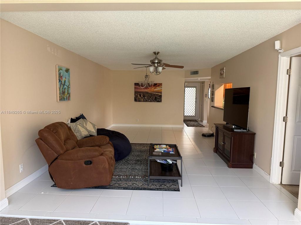 Photo of 1920 Sabal Palm Dr #201, Davie, FL 33324 (MLS # A11849265)