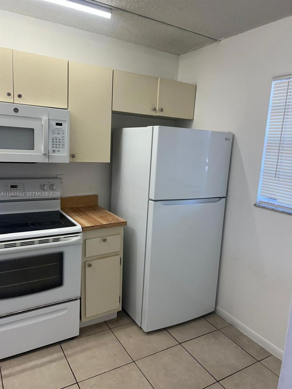 Photo of 10425 NW 8th St #103, Pembroke Pines, FL 33026 (MLS # A11987622)