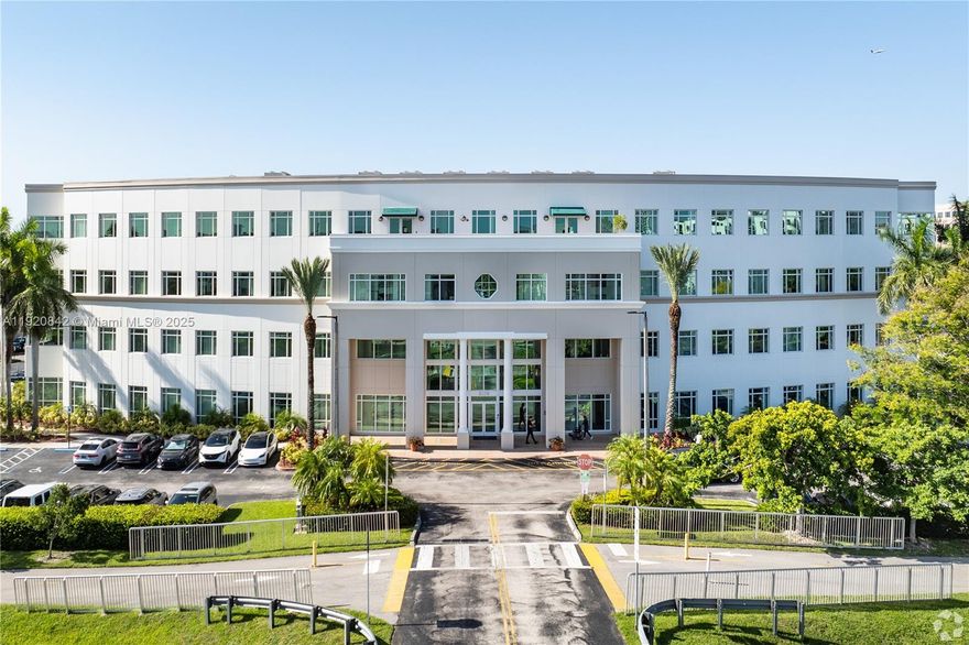 • Grand entrance with ornate finishes
• Tranquil setting in lush, dynamic business environment with water views available
• Electronic directory in lobby
• Four (4) high-speed elevators
• Secure, gated, surface parking available for tenants; 4/1000 parking ratio
• Covered parking available
• Conference rooms with state-of-the-art video system available for rent
• Vending machines on-site
• 24-hour access
• Awarded LEED Silver certification from the US Green Building Council and EPA’s ENERGY STAR rating
• Upgraded to the highest level of Hurricane Resistance