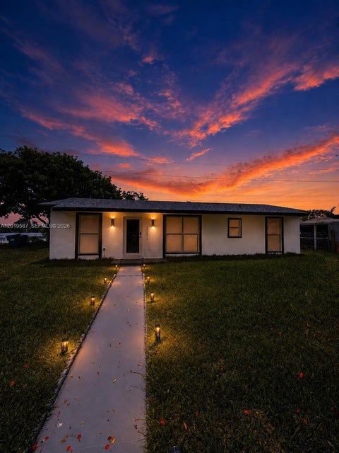 Photo of 20211 NW 42nd Ave, Miami Gardens, FL 33055 (MLS # A12019587)