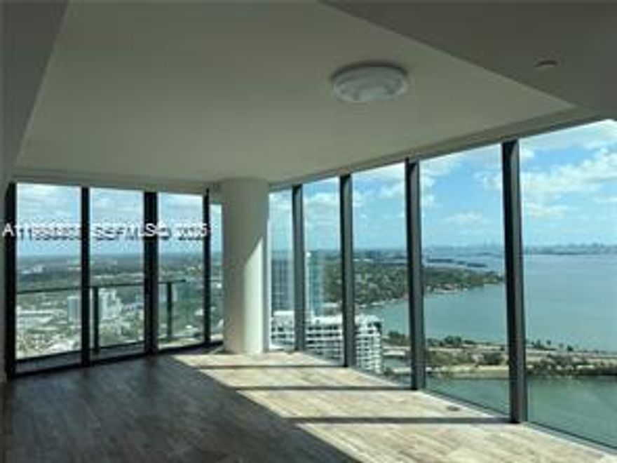 Perched on the 41st floor, this rarely available rental offers a luxury lifestyle in an elegant Corner 1 Bedroom, 1.5 Bathroom apartment at Paraiso Bay. Revel in breathtaking views of the Bay, Ocean, and city skyline, complemented by large custom closets in the master bedroom and the latest appliances. The exclusive Paraiso Bay amenities set a high bar for luxury living, featuring a lagoon-style pool, cutting-edge gym, spa, tennis courts, and a bowling alley. Perfectly situated just minutes from the vibrant Wynwood, the chic Design District, the sun-kissed shores of Miami Beach, and the Airport, this residence is your gateway to the finest Miami has to offer, blending unparalleled style and convenience.