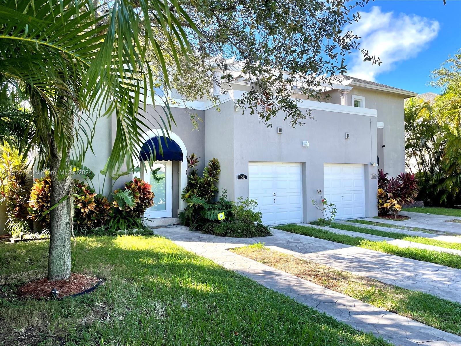 Lots to love! Contemporary 2-story townhome in Biscayne Park/Miami Shores area minutes from every convenience. Bright, open layout offers 3 bedrooms upstairs (master w/balcony) and 2.5 baths. All stainless appliances & washer/dryer inside. High ceilings, Travertine/wood laminate floors & tons of natural light in every room! Impact windows/doors, Smart-home security/camera system, 1-car garage w/additional parking in driveway. Enjoy indoor/outdoor living w/private fenced garden, your own fruit trees & amazing sunsets on the covered patio. Ample room to entertain, relax & dine alfresco under the stars! Pet-friendly w/pet fee. Excellent credit/income reqd.