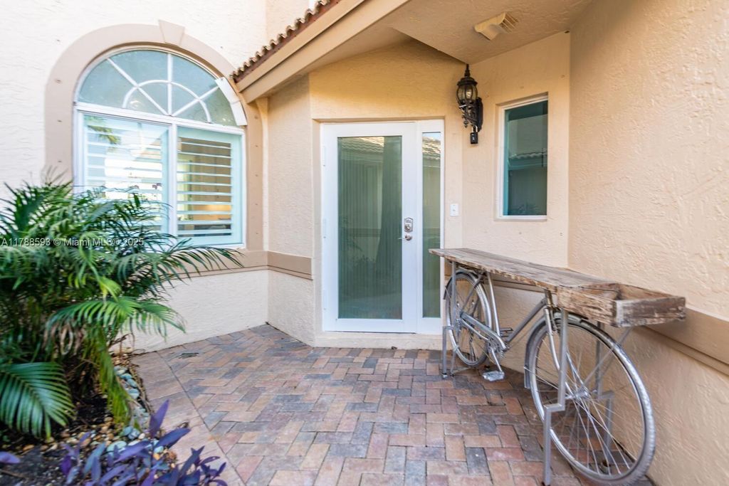 Photo of 5134 W Madison Lakes Cir W, Davie, FL 33328 (MLS # A11788593)