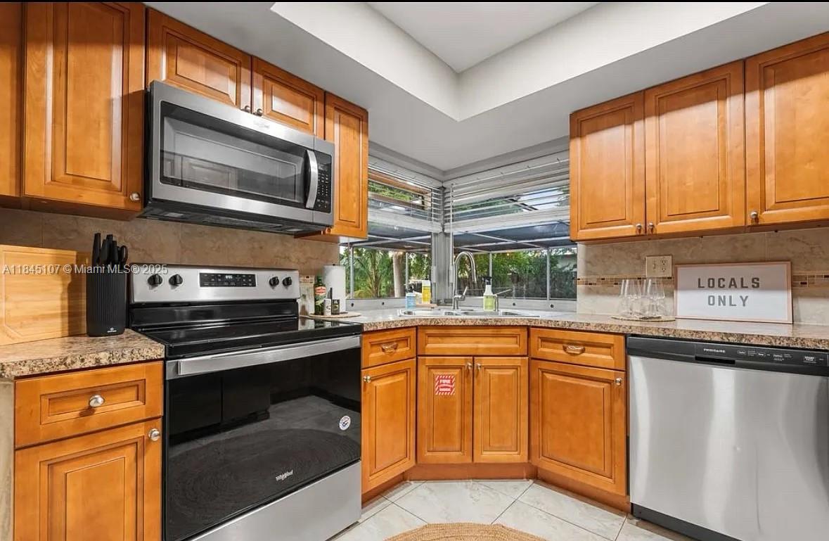4-bedroom, 2-bathroom home is perfect for families or roommates looking for comfort, space, and convenience in Fort Lauderdale. 4 Full Bedrooms , 2 Bathrooms. Updated Kitchen with Modern Appliances. Bright, Open Living Space. In-Unit Washer & Dryer. Central A/C. Large Fenced Backyard Great for Entertaining. Private Driveway with Ample Parking. Located in a quiet neighborhood with quick access to I-95, shops, schools, and just a short drive to the beach and downtown. Available for Immediate Move-In. First, Last & Security Required. Pets Welcome with Approval. Equal Housing Opportunity.