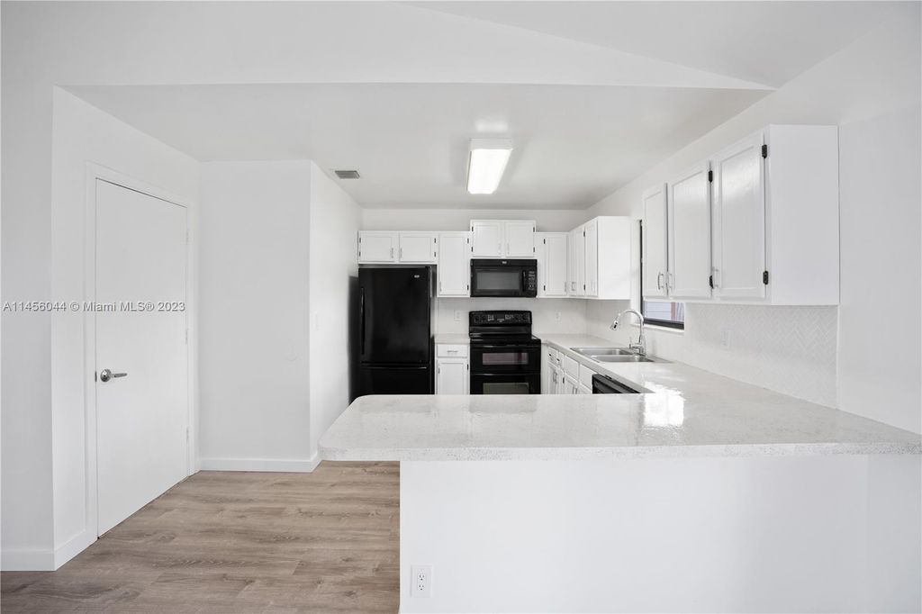 Photo of 6043 Felter St, Jupiter, FL 33458 (MLS # A11456044)