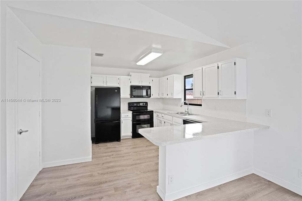 Photo of 6043 Felter St, Jupiter, FL 33458 (MLS # A11456044)