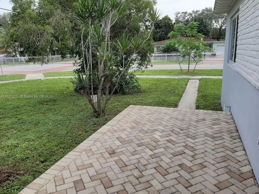 PRICE REDUCTION Quick approval Corner updated single family home. 2-bedroom 1 bathroom PLUS another room for an office, den or in laws quarters with own separate entrance. Tile floors, eat in kitchen space for a table, stainless steel new appliances, large bedrooms, large closets. New WASHER AND DRYER with own separate room. New A/C unit. Nice patio, yard with fruit trees and area to entertain. Close to universities, beaches, restaurants, shopping areas and much more!! Prime location centrally located. Huge yard for BBQ, and dinners. Tiled floors throughout, eat in kitchen, new stainless-steel appliances, updated bathroom. Covered carport. Close to beaches, shopping, restaurants, malls, charter schools and highways. Covered carport, plenty of parking. Very well-maintained property.