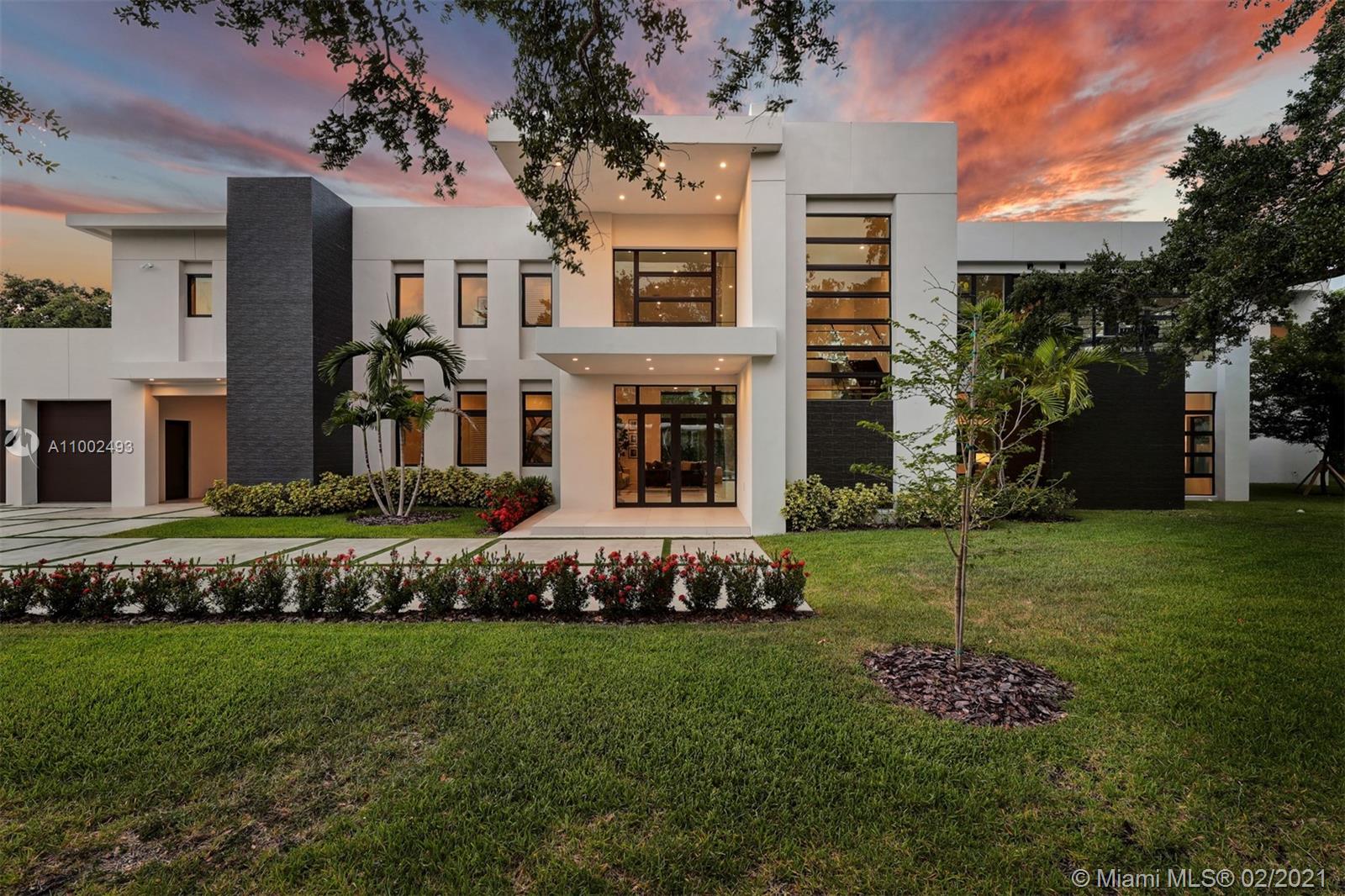 Stunning! This modern masterpiece is crafted with European-style finishes. Featuring an architectural glass facade on both the North and Southside of the home; Uniquely designed with a focus on an open concept. Custom entertainment style kitchen includes Wolf & SubZero appliances, oversized pantry, and family room with access to the pool/spa. Six of the seven bedrooms are ensuite with closets. The corner master suite includes a royal shower, his/her closets, dual vanities, a balcony, and a private outdoor staircase. Additional particulars- Contemporary glass wine room, summer kitchen, and 2 car garage. Flood zone X. Porcelain floors throughout. Just under 9000 total sqft. Located on a private quiet street close to Pinecrest's award-winning schools just 25 minutes to the MIA airport!