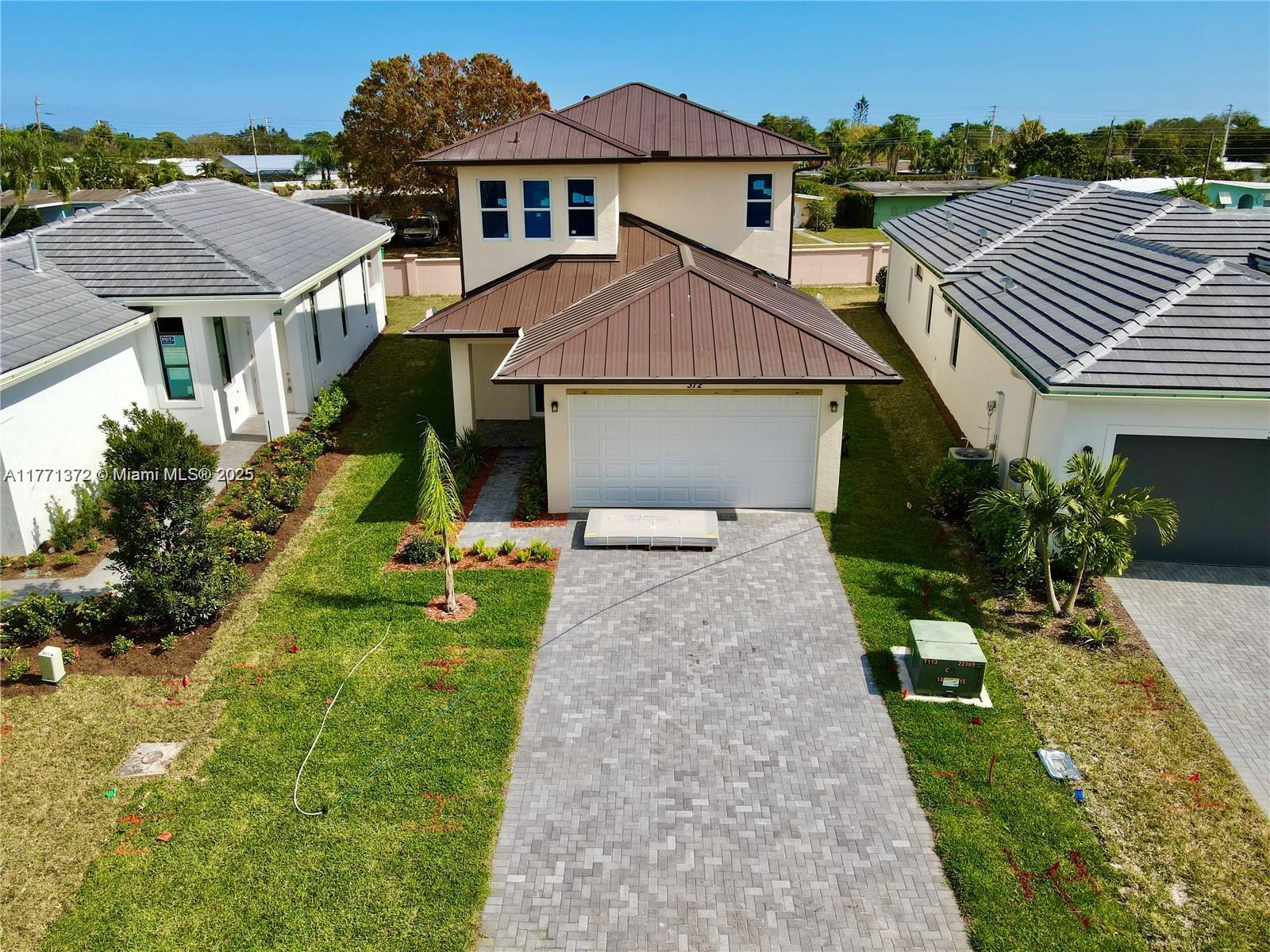 Stunning Brand-New 4Bedroom, 3Bathroom Home in the Heart of Port St. Lucie. Discover your dream home in the FL fastest-growing city! This exquisite residence, crafted by The H&R Organization, offers unparalleled modern living. Step inside to elegant white ceramic flooring, high-impact windows, two AC units. The stylish kitchen boasts granite countertops and sleek cabinetry, the spacious master suite conveniently located on ground floor features a walk-in closet. Designed for both beauty and functionality, this home includes, a 2 car garage, tempered glass handrails leading upstairs, expansive front & back yards. Located in a prestigious gated community, you'll enjoy access to a luxurious clubhouse with a pool, gym, tennis court, and more. Don't miss this opportunity to rent a brandnew home