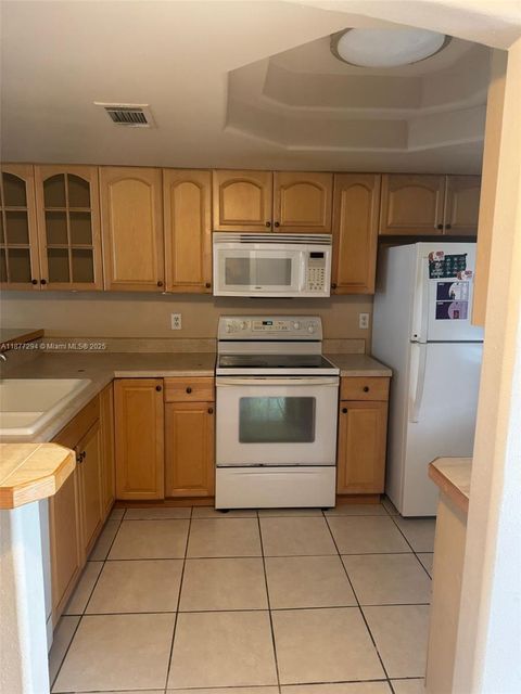 Photo of 5040 terrace Palms Circle #202, Tampa, FL 33617 (MLS # A11877294)