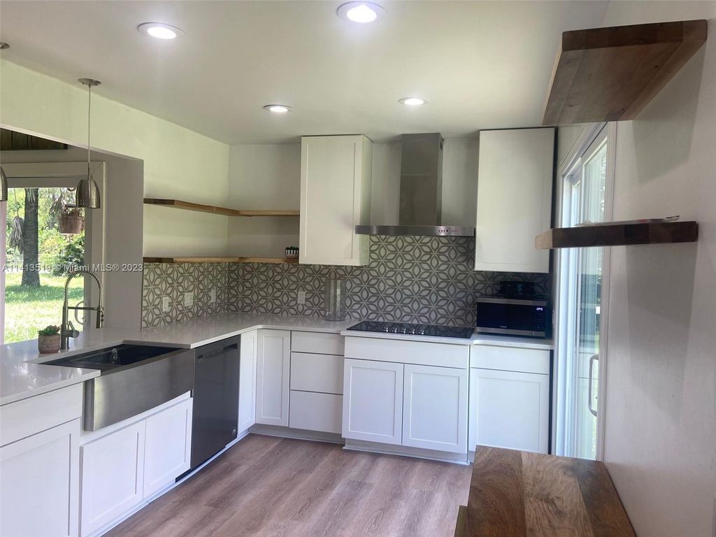 Photo of 16059 E Wiltshire Dr, Loxahatchee, FL 33470 (MLS # A11413519)