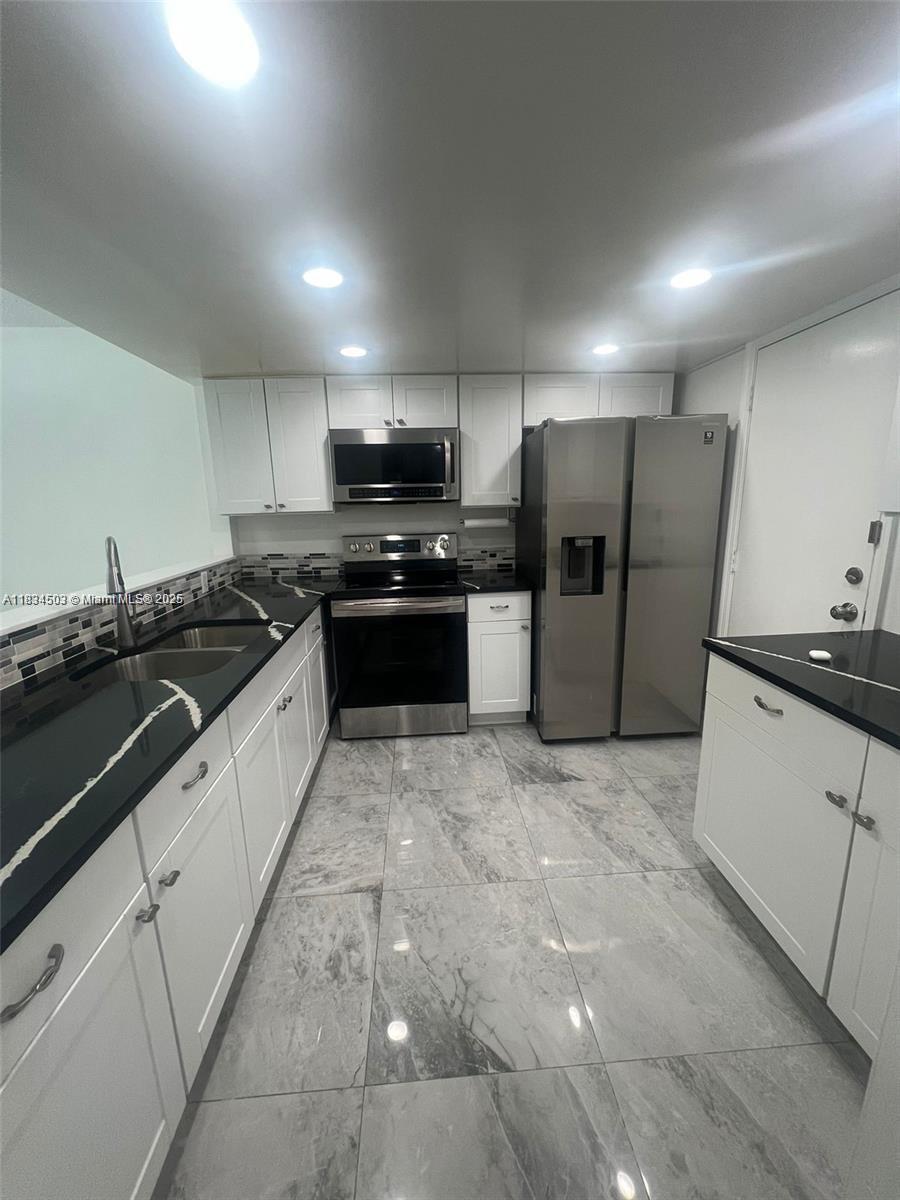 406 NW 68th 215
