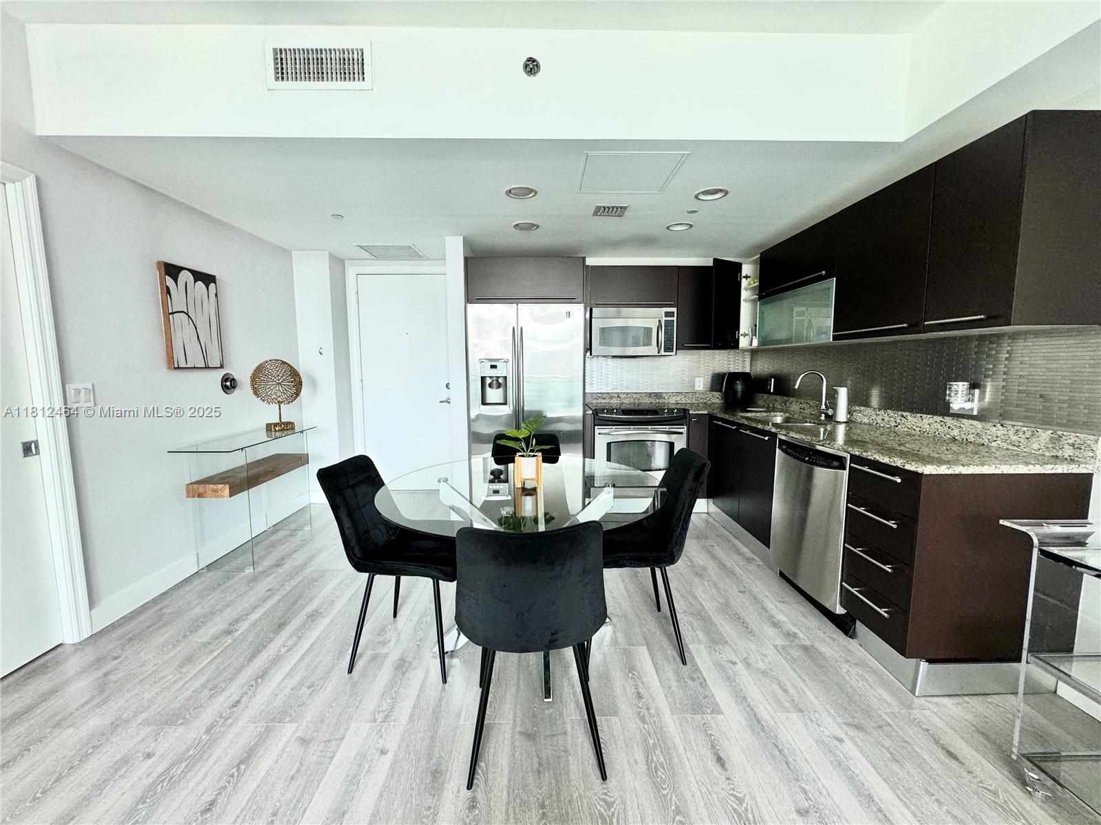 THE PLAZA 901 BRICKELL CO - Residential Lease