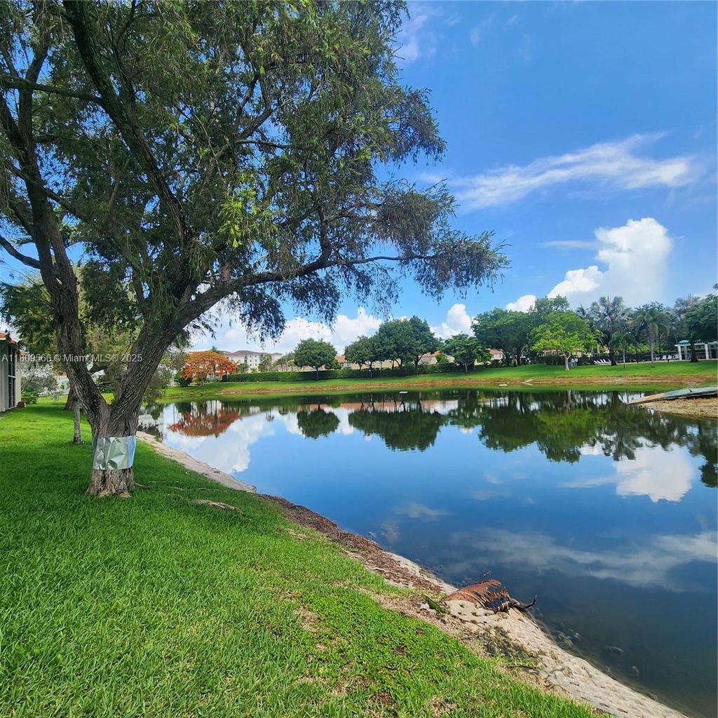 Photo of 5542 Courtyard Dr #5542, Margate, FL 33063 (MLS # A11809566)