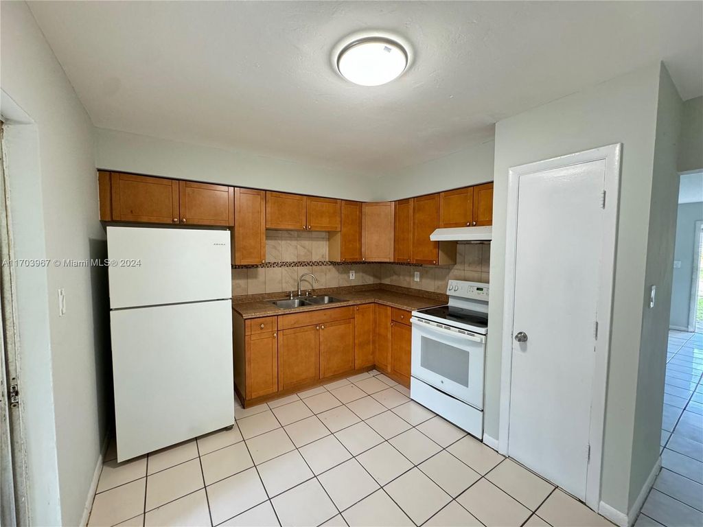 Photo of 5310 NW 16th Ct #1, Lauderhill, FL 33313 (MLS # A11703967)