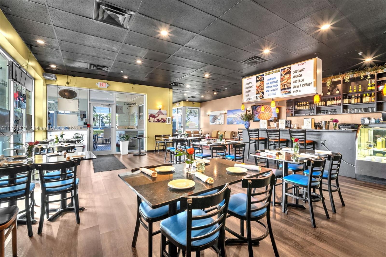 Exceptional opportunity to own a thriving Mediterranean restaurant in the heart of Pompano Beach! Mini Pita is a well-established, profitable business located on busy Atlantic Blvd, offering high visibility and a steady flow of customers. The restaurant features a gourmet Mediterranean menu for lunch, dinner, and late-night dining, along with a beer, wine, and catering menu. Options for dine-in, take-out, and delivery make it versatile and accessible to all clientele. Open 7 days a week from 11 AM to 2 AM, Mini Pita has a strong reputation for excellent food and service.Please refrain from contacting the employees regarding the sale. If you have any questions, we will be happy to assist you. Thank you! Don't miss this chance to invest in a turnkey operation in a prime location!