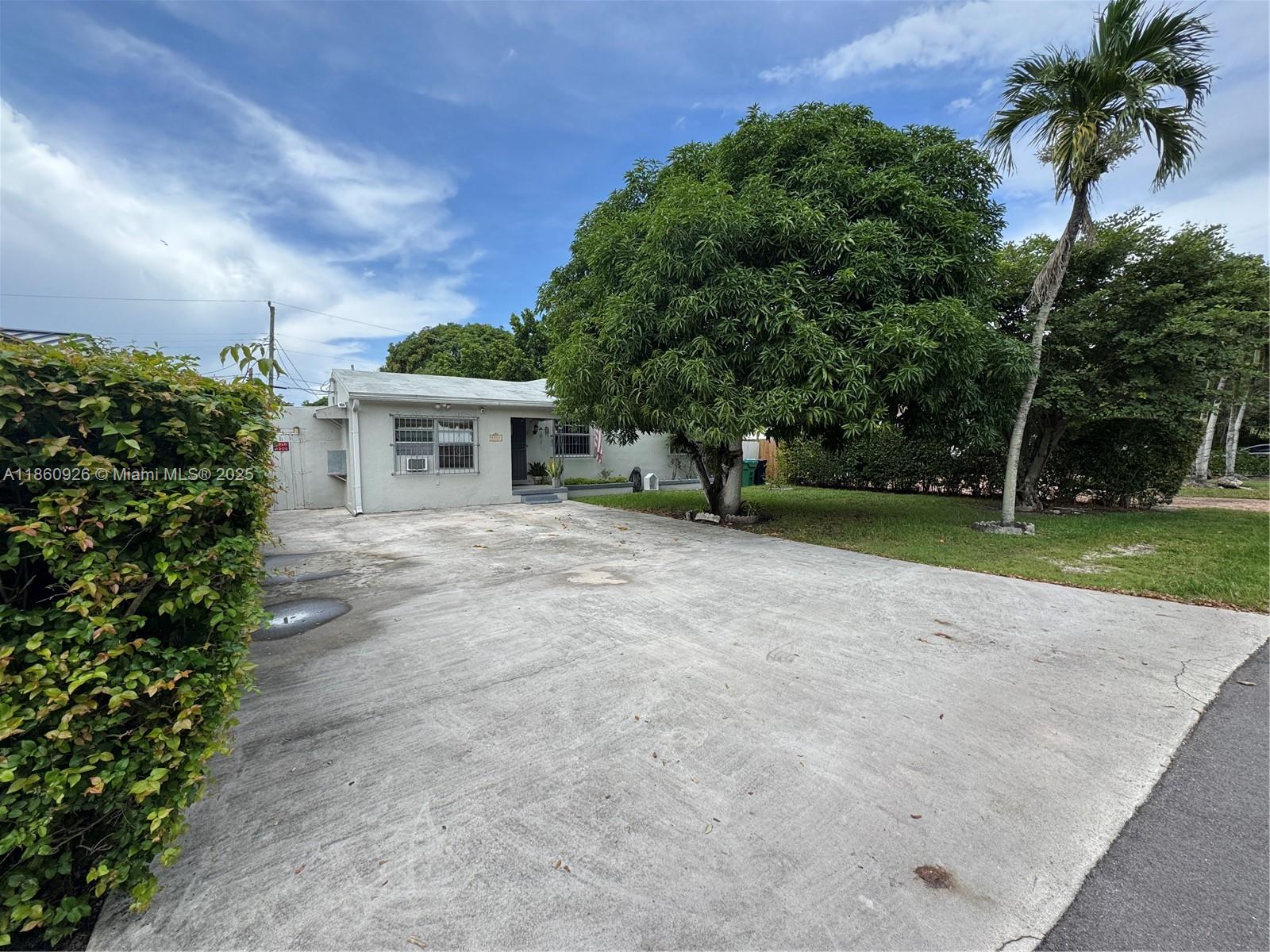 2 bed, 1 bath One story home in Little Gables with a 1 bed, 1 bath efficiency. Perfect for guests or rental income! Features include a bright Florida Room and a spacious yard with plenty of room to build your dream pool. 6,420Sqft lot with great development potential.