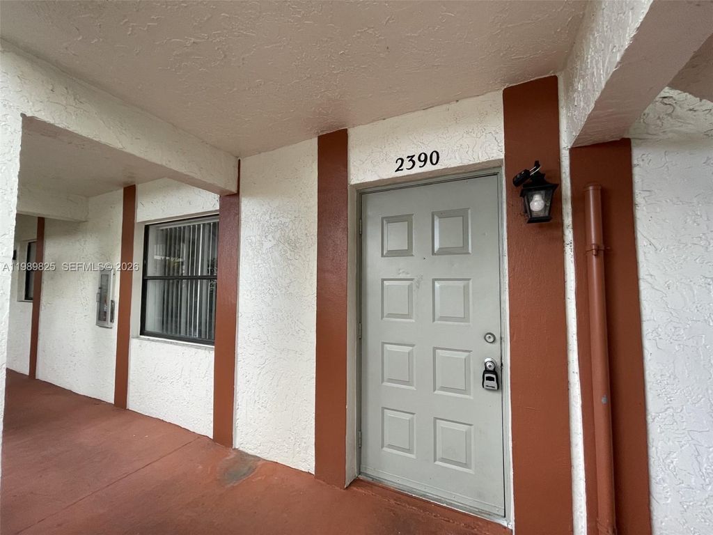 Photo of 2390 Coral Springs Dr #2390, Coral Springs, FL 33065 (MLS # A11989825)