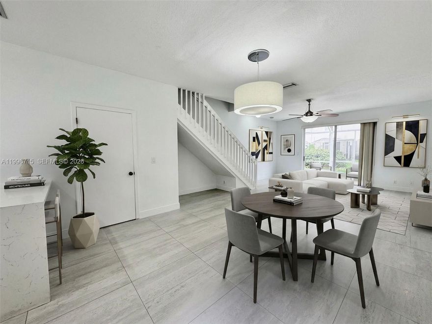 Impeccable townhouse located in the exclusive San Messina community. This residence offers a bright and functional layout with an integrated living–dining area, updated kitchen, modern flooring, and a private patio perfect for relaxing. Spacious bedrooms with excellent storage and updated bathrooms. Prime Weston location close to A-rated schools, shops, highways, and parks. Quiet community with a pool and well-maintained common areas. Move-in ready.