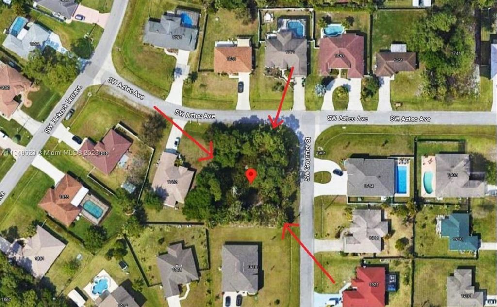 Photo of 1768 SW Aztec Ave, Port Saint Lucie, FL 34953 (MLS # A11349623)