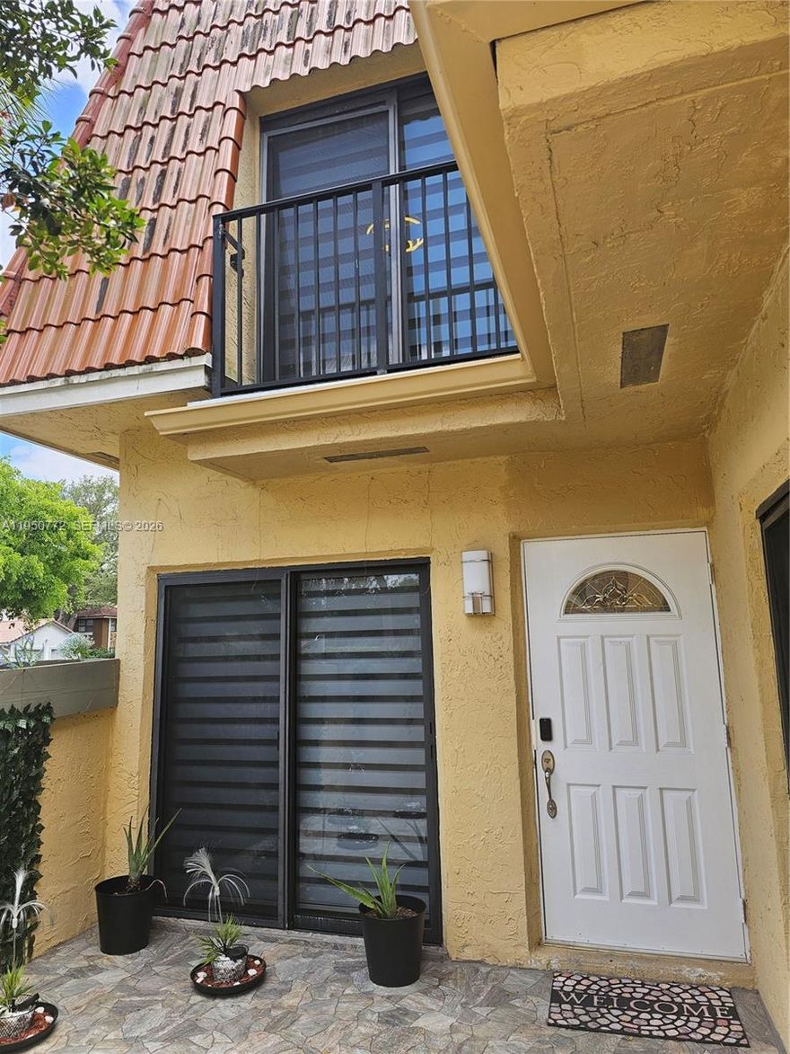 Beautifully remodeled 3-bedroom, 2.5-bath townhouse in the desirable Woodlake Village community in Coral Springs! Offering 1,600 SF of living space, this home features a bright open layout, first-floor entry, ceramic and wood flooring. Features a spacious kitchen with stainless steel appliances and induction oven. The primary bedroom is upstairs, providing privacy and comfort, with additional bedrooms well-sized for guests, office, or flex space. Enjoy your private patio and relaxing pool area views, perfect for entertaining or unwinding. Community amenities include a pool and well-maintained common areas. Conveniently located near schools, parks, shopping, dining, and major roadways for an easy commute. Vacant and ready for immediate occupancy. Schedule your showing today!