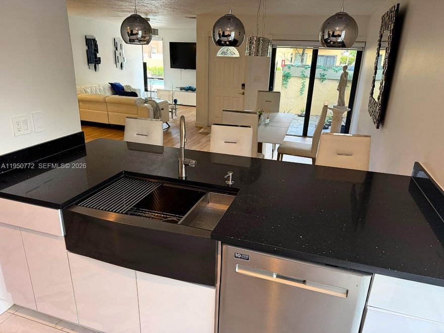 Beautifully renovated 3-bedroom, 2.5-bathroom townhome featuring a bright, open layout, a modern kitchen with sleek finishes, and spacious living areas designed for everyday comfort. The primary bedroom offers a clean, elegant feel, while additional spaces provide flexibility for a home office or guest accommodations. Enjoy a private outdoor patio, perfect for relaxing or entertaining. Move-in ready and thoughtfully designed for a modern lifestyle.