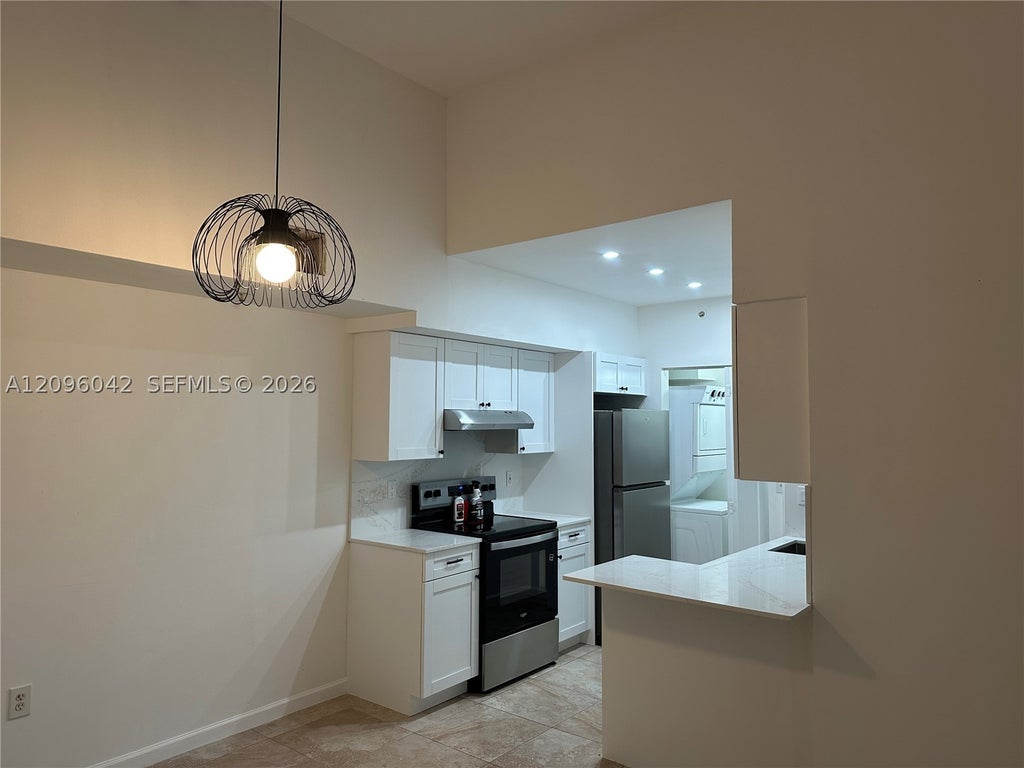 Photo of 3241 Sabal Palm Mnr #302, Davie, FL 33024 (MLS # A12096042)