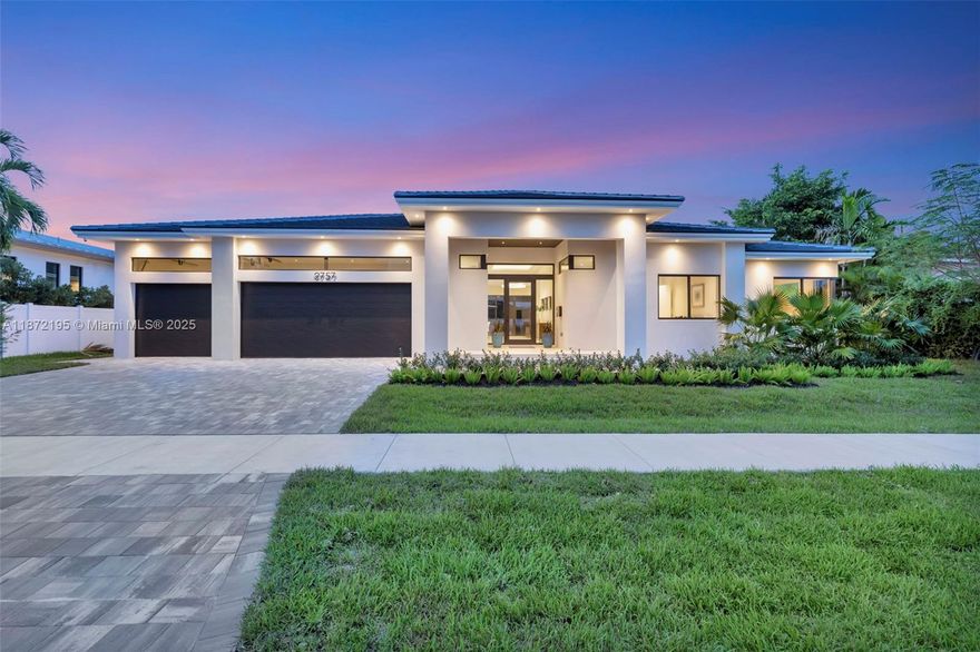 Discover a newly completed custom estate in Coral Ridge Country Club Estates, masterfully designed for both elegance & ease of living. Soaring 12’ ceilings & walls of glass flood the home with natural light, while an 11’ Golden Belly quartz island anchors a chef’s kitchen with Miele Kitchen Suite appliances. Two 16’ sliding glass doors dissolve the boundary between indoors & outdoors, leading to a resort-style pool, jacuzzi, cabana bath & summer kitchen for al fresco dining. The spa-inspired primary suite features a wet room with soaking tub & shower, while three additional suites ensure privacy for guests. 3-car garage with lift potential & a total smart home system complete this rare opportunity to own a true modern masterpiece in one of Ft Lauderdale’s most prestigious neighborhoods