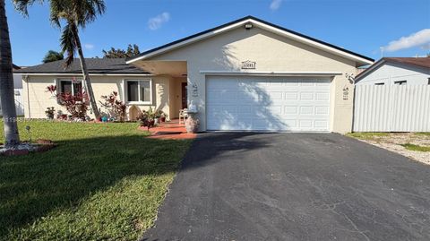 Photo of 12285 SW 257th Ter, Homestead, FL 33032 (MLS # A11948192)