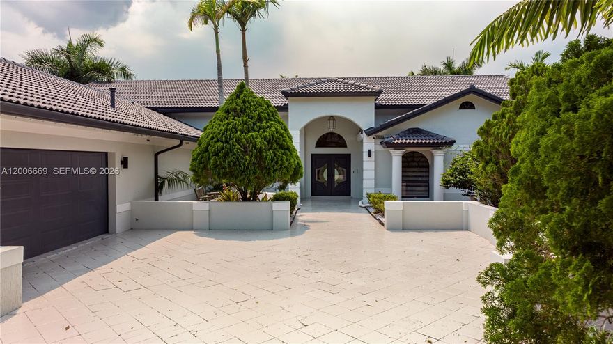 Most homes offer comfort—this one delivers land, privacy, and a true Plantation Acres lifestyle. Set on an expansive 40,000 sq ft lot in the highly sought-after Plantation Acres, this 7-bedroom, 5-bath estate offers a rare combination of space and tranquility just minutes from everything.

With approximately 3,800 sq ft under air, the home feels far larger thanks to soaring vaulted ceilings, open living areas, and natural light throughout. The layout is designed for both everyday living and entertaining, with a seamless flow between the gourmet kitchen, dining, and multiple gathering spaces. The kitchen features high-end appliances and refined finishes—ideal for hosting and daily use alike.

The exterior is where this property truly shines. Sitting on nearly an acre, the backyard feels like a private retreat—lush, peaceful, and incredibly relaxing. The pool area is surrounded by greenery and open space, creating a setting that feels calm, secluded, and far removed from the typical South Florida density. Whether you’re entertaining or unwinding, the atmosphere is effortless and serene.

The property also features a huge driveway with ample parking, adding both convenience and a strong estate feel from the moment you arrive.

Living in Plantation Acres is a major draw. Known for its oversized lots, quiet streets, and estate-style homes, it offers something increasingly rare—space and privacy without sacrificing location.