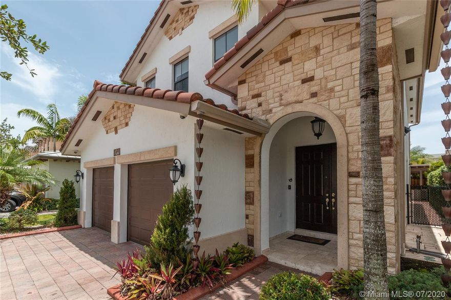 Like brand new spectacular Single-Family home located in the most exclusive community in the heart of Doral, Vintage Estates. This house has some many wonderful details; must see to appreciate. 1 bedroom, in the first floor with full bath, and 3 upstairs with wood floors, impeccable Italian closets and blackouts. All bathrooms with marble finishes and glass enclosure. Italian design kitchen with stainless steel appliances and wine cooler. 2 cars garage with custom epoxy floor covering and special closet storage, laundry room with cabinets. Unique patio with travertine marble floor, gazebo, barbecue grill, bar and external mini fridge. Integrated sound system for interior and exterior, smart security system with 16 cameras and alarm.