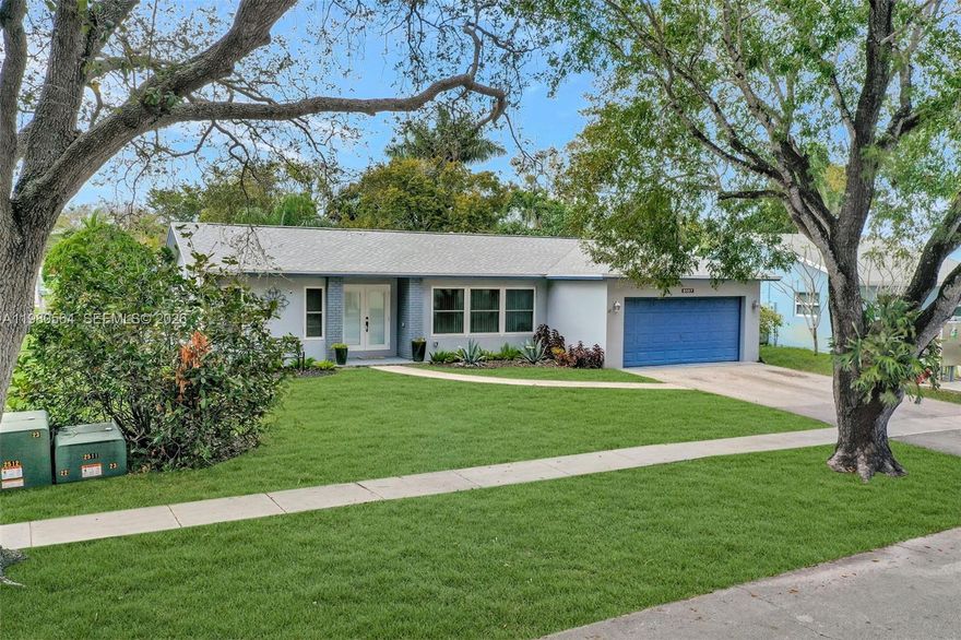 Timberlake in Cooper City! Those who know CC know this is a highly coveted area and homes like this rarely come available - This is a spacious 3-bedroom, 2-bath pool home on the water with a nature lover's back yard.  Enjoy nearby top-rated Cooper City schools. Convenient location near Brian Piccolo Park, Tree Tops Park, shopping, dining, major highways and houses of worship.  This home features tile and laminate flooring throughout, full hurricane protection on all openings, and a 2-year-old roof with warranty. A/C is newer, as is the pool pump and automatic saltwater system. Pride of ownership is apparent. All systems have been recently updated or meticulously maintained. Interior has been professionally painted with SW Snowbound, the best off-white 'color' and the best paint money can buy.  Kitchen features gorgeous granite countertops, tons of cabinetry for easy storage and organization options, stainless steel appliances, and overlooks the pool and backyard. Washer and Dryer are indoors 'under air' in a generously-sized laundry room. Enjoy exceptional outdoor living with a retractable screened patio facing the pool, a natural travertine pool deck, and a spectacular oversized backyard overlooking the canal. Lush foliage and beautiful landscaping create a classic Old Florida tree canopy feel, providing shade, privacy, and a serene backyard retreat. Easy to show. Call today for a private tour.