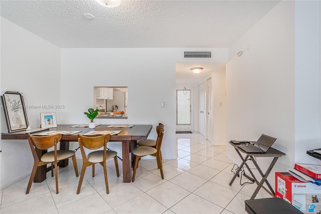 Photo of 5860 NW 64th Ave #302, Tamarac, FL 33319 (MLS # A11768098)