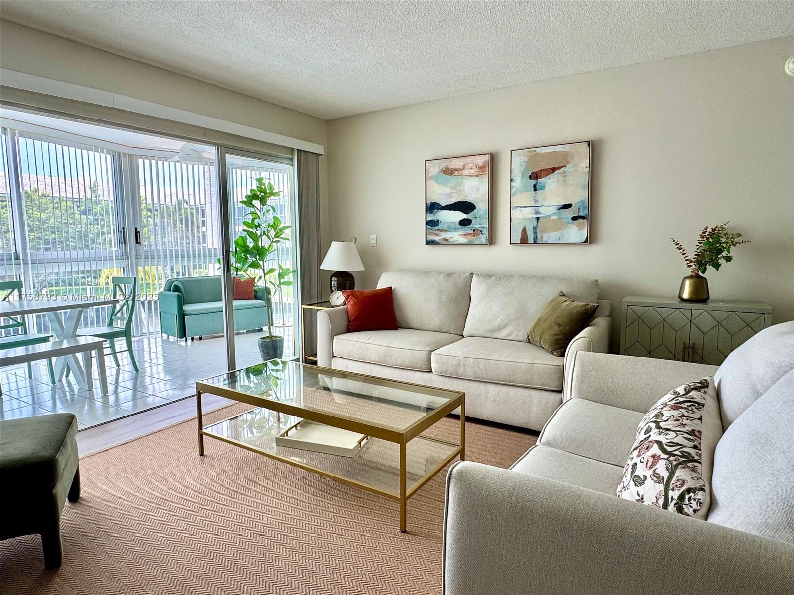 Excelent conditions and large Waterfront One bedroom condo, Furnished, with one full and half baths, located in Coral Ridge; located just a few buildings from the Intracoastal Waterway. Walking distance to restaurants and the beach. This unit features newer laminated floor, updated bathrooms, enclosed balcony for additional living space, stainless steel applicances, track lighting, fans, large walk-in closet and a built in, floor to ceiling book shelves. A must see before it goes!