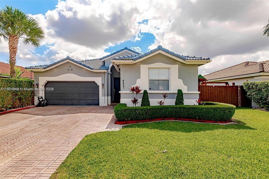 Welcome to this beautifully maintained 4-bedroom, 2-bathroom single-family home with a spacious two-car garage, located in the highly desirable Melrose Landing community. Enjoy resort-style living with breathtaking, unobstructed lake views right from your front yard. This home is in mint condition and has been thoughtfully updated throughout, featuring a recently remodeled kitchen and bathrooms, and custom walk-in closets. The expansive backyard has been transformed into a private entertainment oasis—perfect for hosting family gatherings, celebrations, or simply relaxing. Situated in a quiet, private, and well-maintained community, this move-in ready home offers peace of mind and effortless living.