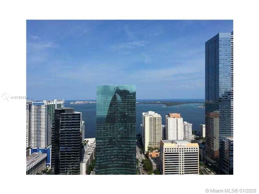 Spectacular!!! INFINITY - Spacious 1 Bed/ 1.5 Bats- PANORAMIC VIEWS!! OCEAN AND MIAMI SKYLINE VIEWS!! Facing East- Finished with Tile and many upgrades- Granite counter tops and stainless steel appliances.  In the Heart of Brickell!  Walking distance to Mary Brickell Village, Restaurants, Shopping etc...One of the Largest Loft in the Building > 992 sq ft.