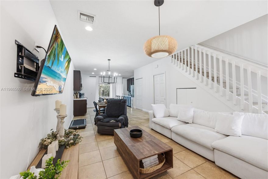 Welcome To This Newer Construction 2 Bed 2.5 Bathrooms With An Office/Den. This Home Offers A Brand New Kitchen Featuring Quartz Countertops And A Large Island Perfect For Bar Seating, Creating A Clean And Modern Feel Throughout. Charming Design With Plenty Of Closet Space And Additional Storage Under The Stairs. Very Quiet And Private Setting. Newer Vinyl Flooring On The Stairs And Second Floor Adds To The Updated Look. Enjoy Low HOA Fees And A Great Location Conveniently Situated Between Major Highways, Shopping, And Dining.