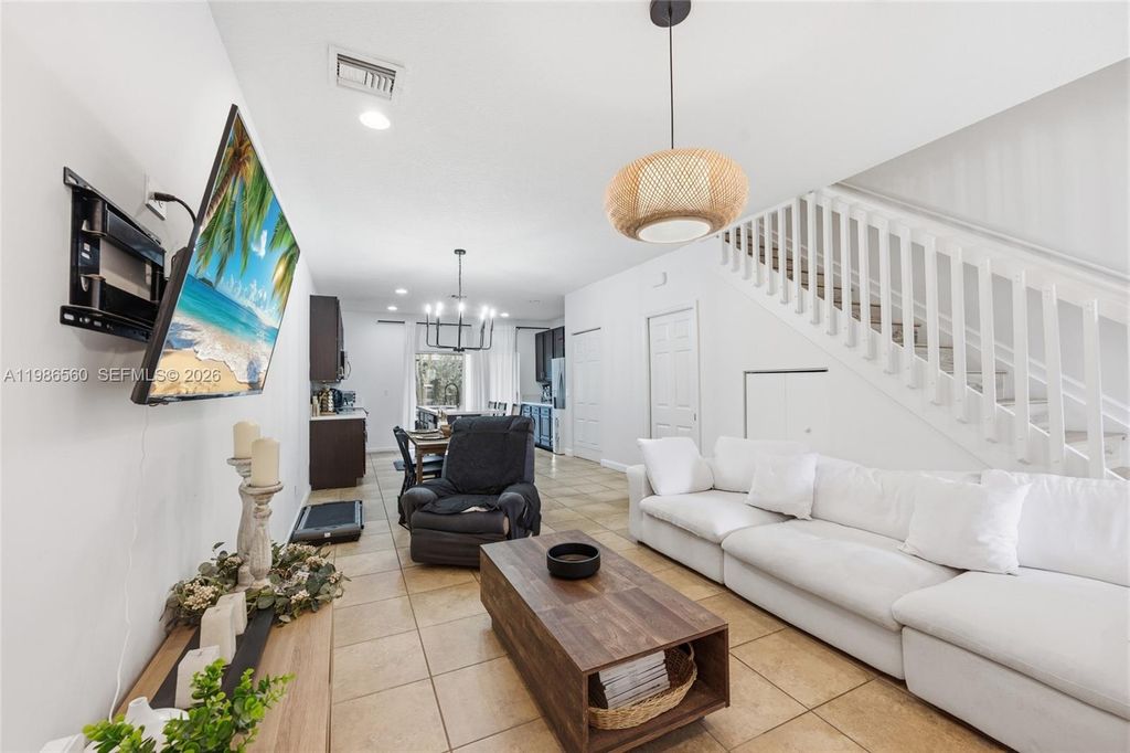 Photo of 5918 Woodlands Blvd, Tamarac, FL 33319 (MLS # A11986560)