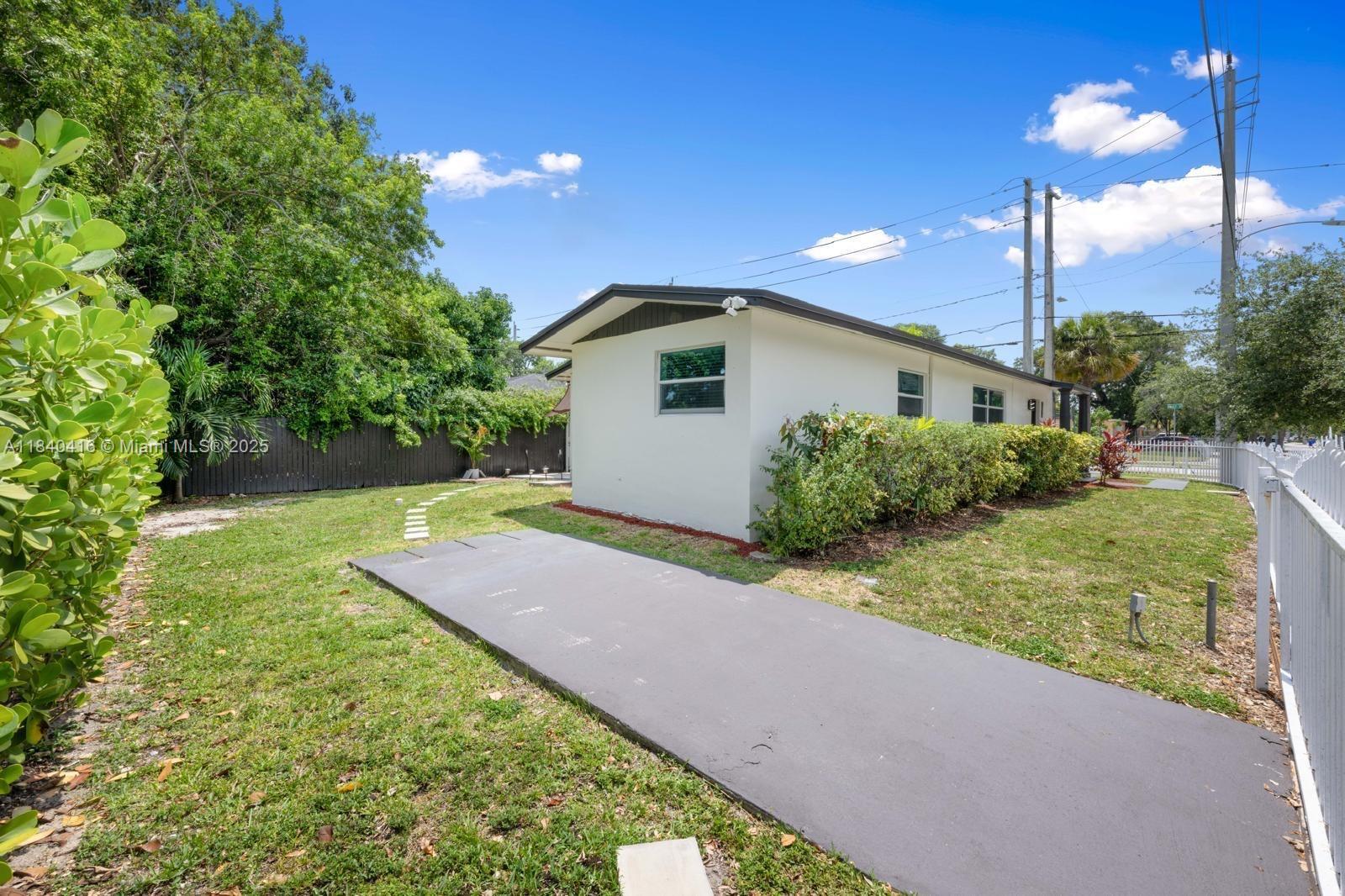 BEAUTIFULL CORNER HOUSE WITH A LARGE BACKYARD WITH PLENTY OF SPACE FOR CARS, RV OR A BOAT, NEW IMPACT WIDOWS AND DOORS, LOCATED IN A PRIME AREA FOR SHORT TERM RENTAL, CLOSE TO WINWOOD, DESIGN DISTRICT AND MIDTOWN HAS AN SMALL APPARTMENT TO GENERATE EXTRA INCOME, YOU HAVE TO COME SAN SEE FOR YOURSELF THIS IS A HIDDEN GEM LOCATED IN A VERY COVETED AREA
