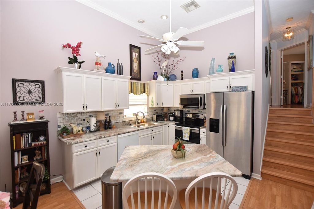 Photo of 1143 Nettles Blvd, Jensen Beach, FL 34957 (MLS # A11762882)