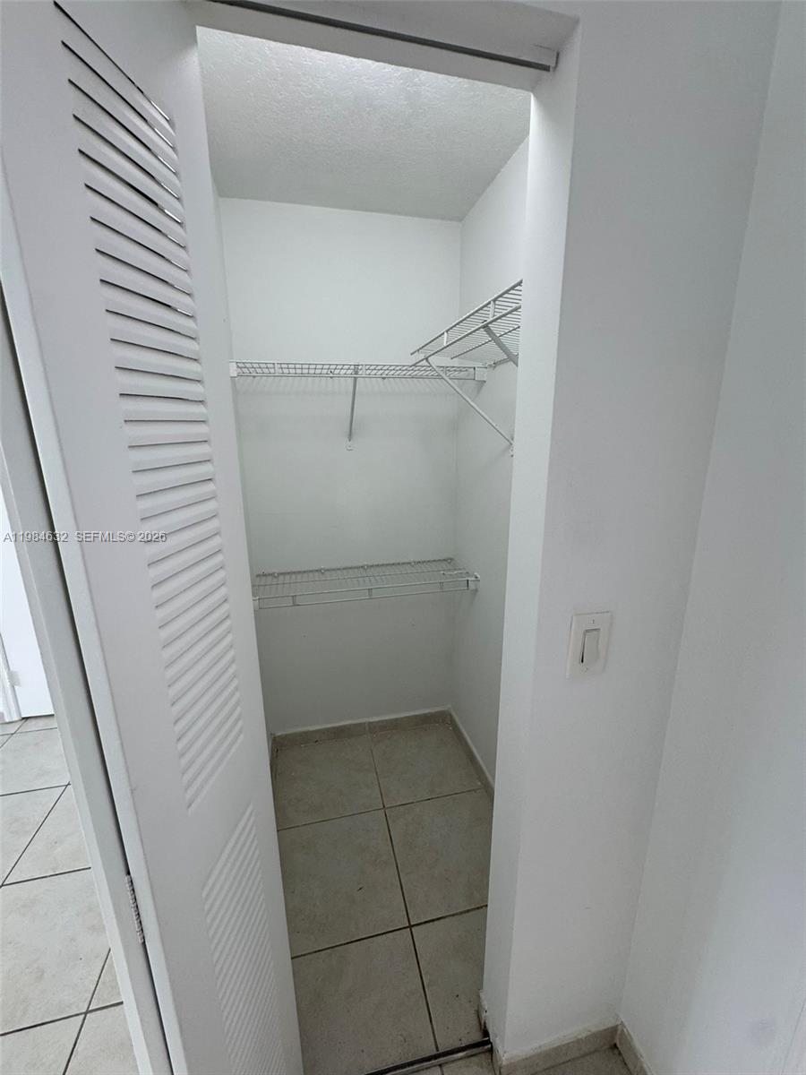 PALM GARDENS AT DORAL CON - Residential Lease