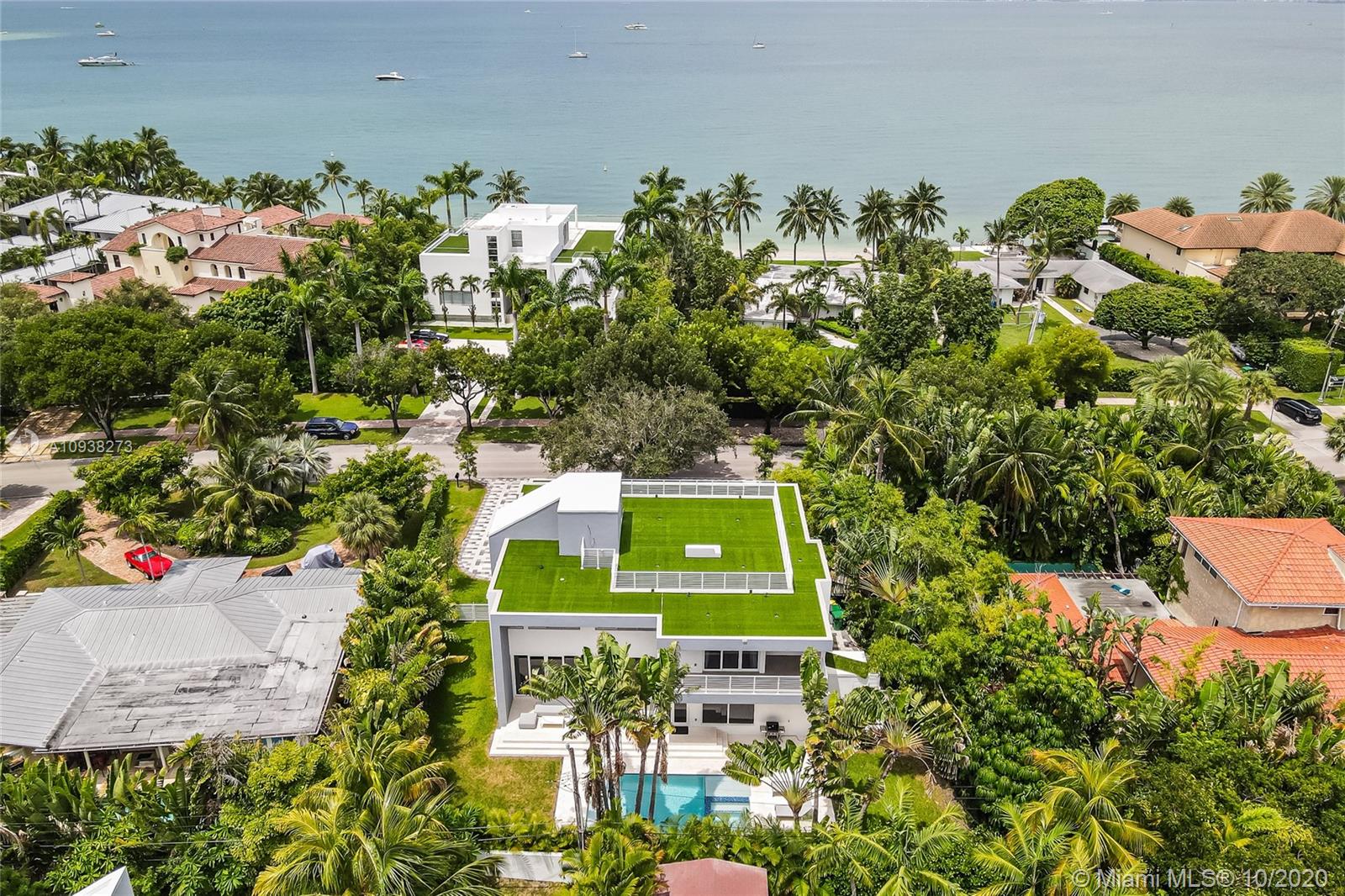 Extraordinary brand new home located on exclusive Harbor Dr. with an incredibly oversized lot. This modern home has a very open floor plan and features 7 bedrooms, 7 full bathrooms plus a powder rooms. An elegant elevator offers access to all 3 floors and a stunning roof top terrace with bay views and ocean breeze ideal to enjoy sunset cocktails or sunbath. Wonderful driveway and carport allow you to fit several cars. Enjoy your spectacular pool and ample garden are with Jacuzzi, Cabana bathroom and a fantastic terrace to entertain. **SEE VIDEO IN VIRTUAL TOUR**