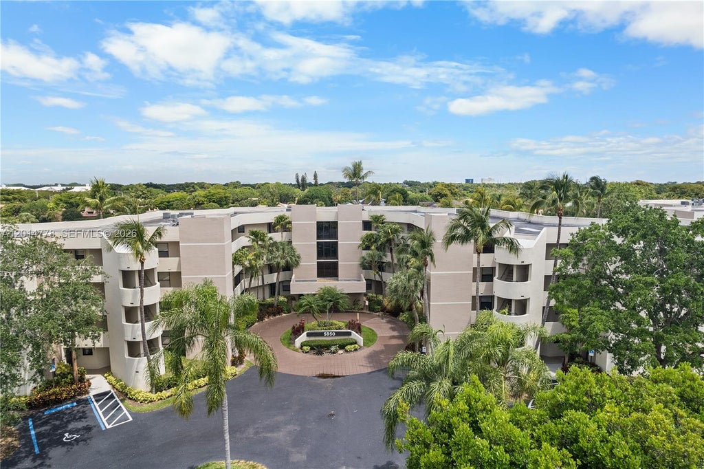 Photo of 5850 Camino Del Sol #404, Boca Raton, FL 33433 (MLS # A12014778)