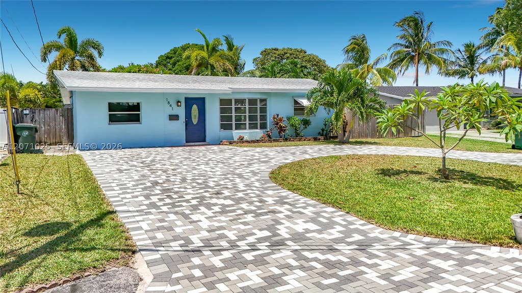 Photo of 1841 NW 33rd Ct, Oakland Park, FL 33309 (MLS # A12071025)