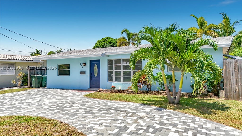Photo of 1841 NW 33rd Ct, Oakland Park, FL 33309 (MLS # A12071025)