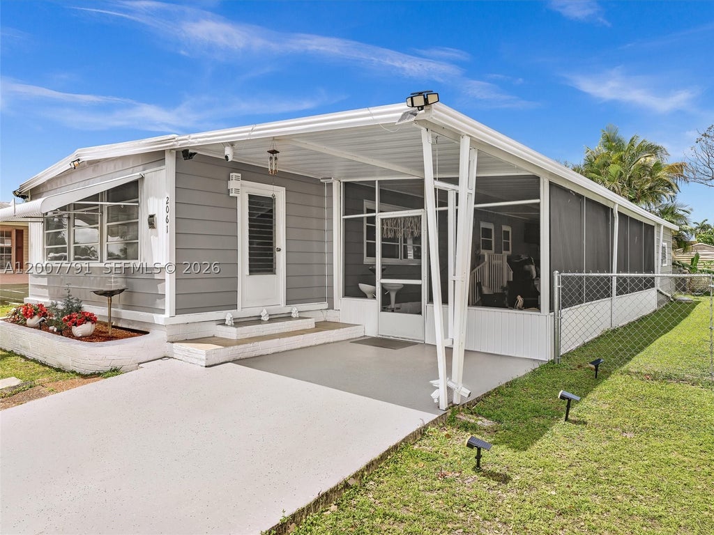 Photo of 2061 SW 83rd Ave, Davie, FL 33324 (MLS # A12007791)