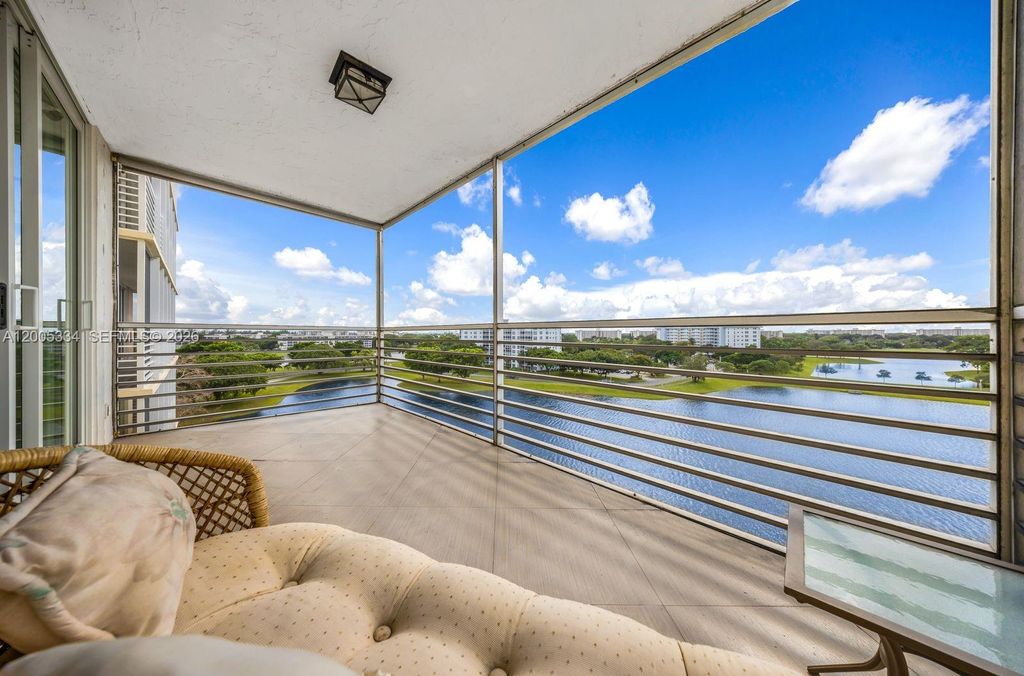 Photo of 3095 N Course Dr #811, Pompano Beach, FL 33069 (MLS # A12005334)